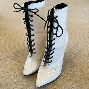 White patent leather look boots.